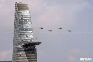 Aerial Spectacle: Fighter Jets and Helicopters Train Over Ho Chi Minh City - image 13