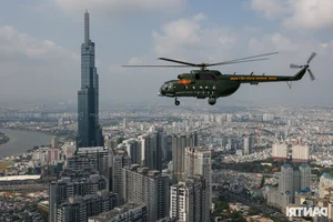 Aerial Spectacle: Fighter Jets and Helicopters Train Over Ho Chi Minh City - image 5