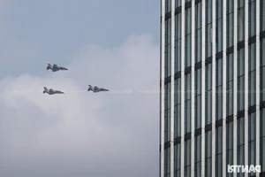 Aerial Spectacle: Fighter Jets and Helicopters Train Over Ho Chi Minh City - image 2