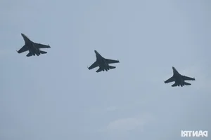 Aerial Spectacle: Fighter Jets and Helicopters Train Over Ho Chi Minh City - image 0