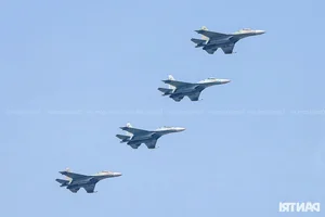 Aerial Spectacle: Fighter Jets and Helicopters Train Over Ho Chi Minh City - image 7