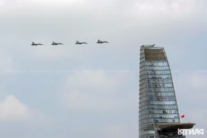 Aerial Spectacle: Fighter Jets and Helicopters Train Over Ho Chi Minh City - image 12