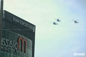 Aerial Spectacle: Fighter Jets and Helicopters Train Over Ho Chi Minh City - image 10