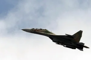 Aerial Spectacle: Fighter Jets and Helicopters Train Over Ho Chi Minh City - image 21