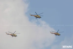 Aerial Spectacle: Fighter Jets and Helicopters Train Over Ho Chi Minh City - image 14