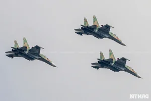 Aerial Spectacle: Fighter Jets and Helicopters Train Over Ho Chi Minh City - image 19