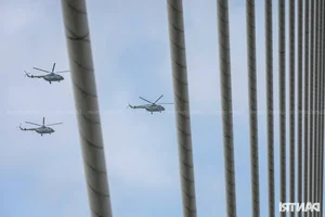 Aerial Spectacle: Fighter Jets and Helicopters Train Over Ho Chi Minh City - image 16