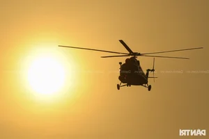 Aerial Spectacle: Fighter Jets and Helicopters Train Over Ho Chi Minh City - image 20