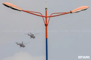 Aerial Spectacle: Fighter Jets and Helicopters Train Over Ho Chi Minh City - image 24