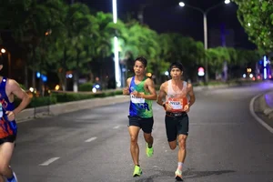 Trung Cuong and Thu Hang Claim Victory at VnExpress Marathon Nha Trang 21km - image 2