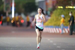 Trung Cuong and Thu Hang Claim Victory at VnExpress Marathon Nha Trang 21km - image 8
