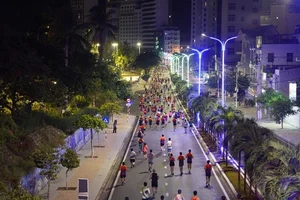 Trung Cuong and Thu Hang Claim Victory at VnExpress Marathon Nha Trang 21km - image 6
