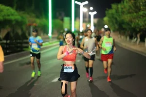 Trung Cuong and Thu Hang Claim Victory at VnExpress Marathon Nha Trang 21km - image 4