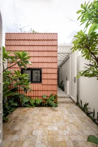 Unique Tube House in Can Tho Featuring Seven Integrated Indoor Gardens - image 7