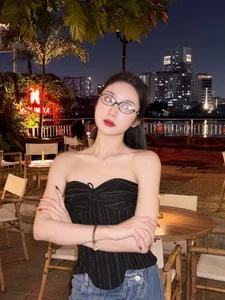 Mina Young Shines in Captivating Saigon Night Street Photoshoot - image 4