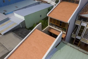 Architectural Marvel: The Stunning Red Tile House in the Heart of Can Tho - image 3