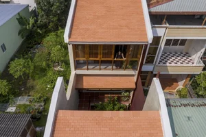 Architectural Marvel: The Stunning Red Tile House in the Heart of Can Tho - image 4