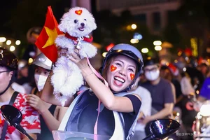Millions Flood the Streets as Vietnam Celebrates ASEAN Cup 2024 Championship - image 12