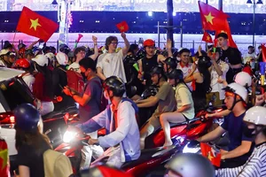Millions Flood the Streets as Vietnam Celebrates ASEAN Cup 2024 Championship - image 20