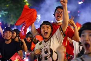 Millions Flood the Streets as Vietnam Celebrates ASEAN Cup 2024 Championship - image 34