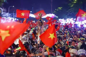 Millions Flood the Streets as Vietnam Celebrates ASEAN Cup 2024 Championship - image 27