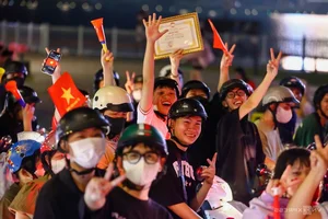 Millions Flood the Streets as Vietnam Celebrates ASEAN Cup 2024 Championship - image 29