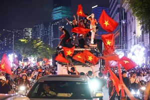 Millions Flood the Streets as Vietnam Celebrates ASEAN Cup 2024 Championship - image 16