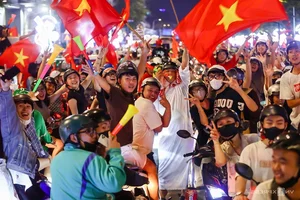 Millions Flood the Streets as Vietnam Celebrates ASEAN Cup 2024 Championship - image 21