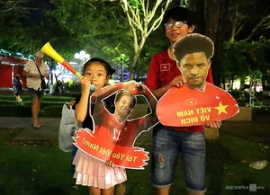 Millions Flood the Streets as Vietnam Celebrates ASEAN Cup 2024 Championship - image 33