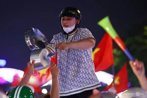 Millions Flood the Streets as Vietnam Celebrates ASEAN Cup 2024 Championship - image 19