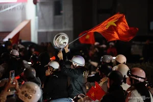 Millions Flood the Streets as Vietnam Celebrates ASEAN Cup 2024 Championship - image 14