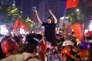 Millions Flood the Streets as Vietnam Celebrates ASEAN Cup 2024 Championship - image 24