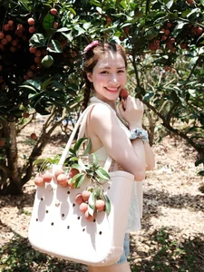 Hoa Minzy Captivates Fans with Ethereal Lychee Garden Photoshoot - image 8