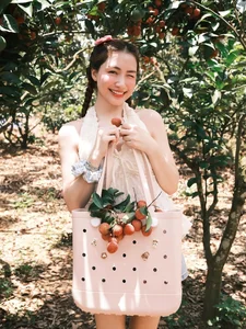 Hoa Minzy Captivates Fans with Ethereal Lychee Garden Photoshoot - image 2