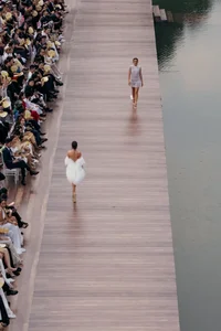 H'Hen Nie and Ngoc Chau Make Dramatic Catwalk Entrance on Rafts - image 6