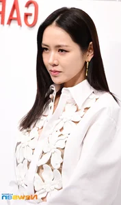 Son Ye Jin Makes Rare Public Appearance at Seoul Fashion Event Post-Childbirth in Stunning White Cut-Out Dress - image 7