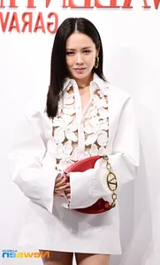 Son Ye Jin Makes Rare Public Appearance at Seoul Fashion Event Post-Childbirth in Stunning White Cut-Out Dress - image 2