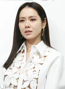 Son Ye Jin Makes Rare Public Appearance at Seoul Fashion Event Post-Childbirth in Stunning White Cut-Out Dress - image 3