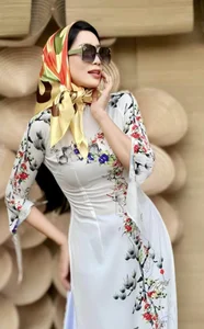 Vietnamese Celebrities Shine in Elegant Ao Dai for Tet Celebrations - image 1