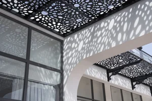 Modern Villa Architecture: Perforated Steel Walls Creating a 'Sunlight Flower' Effect - image 8