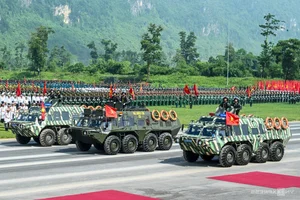 Vietnam Police Showcase New Armored and Amphibious Vehicles in Parade Rehearsal - image 0