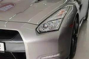 Stunning Silver Nissan GT-R R35: The Iconic Supercar Killer Spotted in a Modern Urban Landscape - image 1