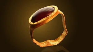 The Mystery of the Medieval Gold Ring Set with Red and Purple Gemstones - image 1