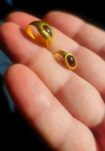 The Mystery of the Medieval Gold Ring Set with Red and Purple Gemstones - image 5