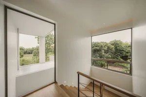 Stunning West-Facing Sloped House Design Embraces Challenging Terrain - image 9