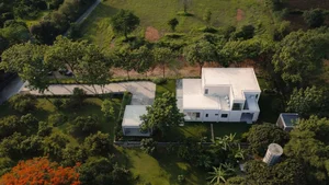 Stunning West-Facing Sloped House Design Embraces Challenging Terrain - image 3