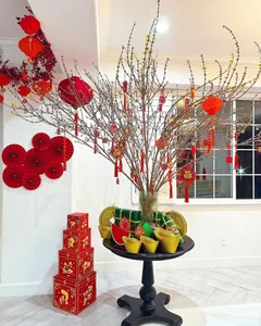 Vietnamese Celebs Decorate for Tet: The Red Paper Fan Trend - image 4
