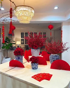 Vietnamese Celebs Decorate for Tet: The Red Paper Fan Trend - image 1