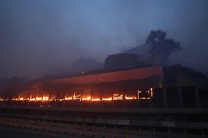 Devastating California Wildfires Force Evacuation of 30,000 Residents - image 11