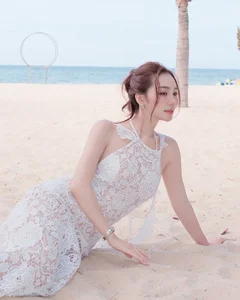 Viral TikToker Stuns in Sheer Lace Dress: A Masterclass in Beachfront Fashion - image 8